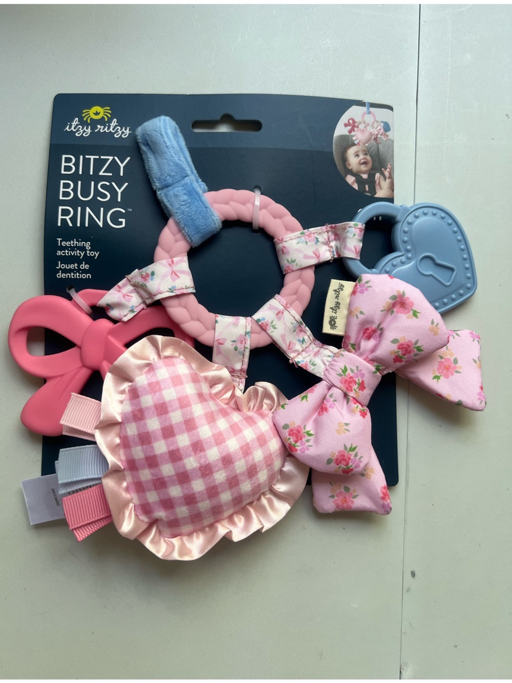 Itzy Ritzy Bitzy Busy Ring Teething Activity
Toy - Bows & Hearts